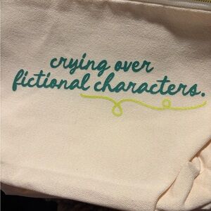 Cream Canvas Pouch with Teal and Yellow Text
